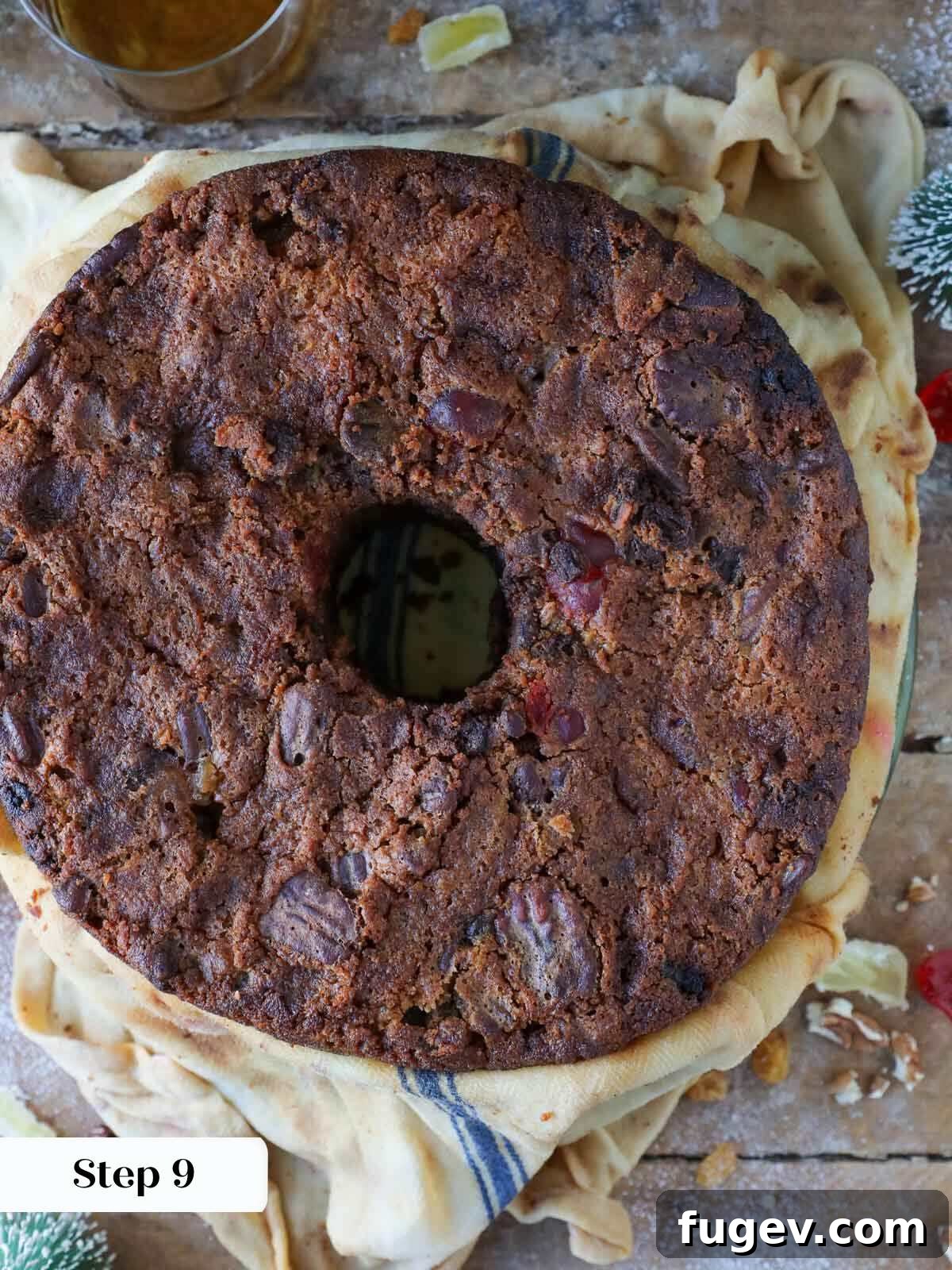 Candied Fruit Confection 8 Baked fruit cake unwrapped from a brandy-soaked towel.