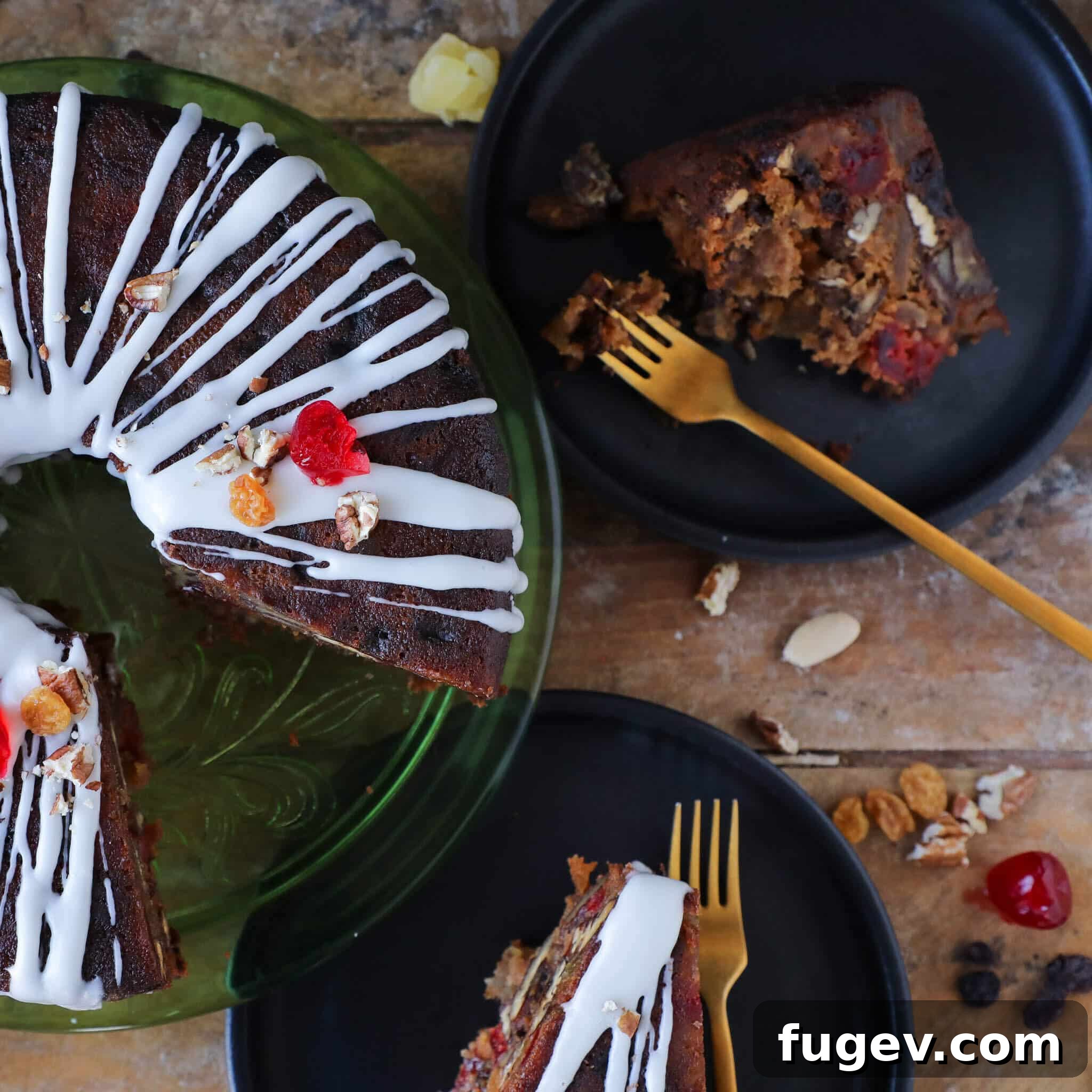 Candied Fruit Confection 10 Christmas fruit gateau with a gold fork, ready to be enjoyed.