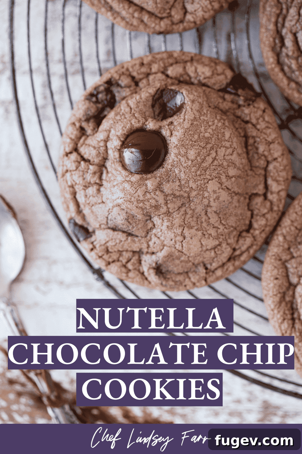 Gooey Nutella Cookies 7 A single Nutella cookie on a cooling rack, perfectly baked and ready to eat.