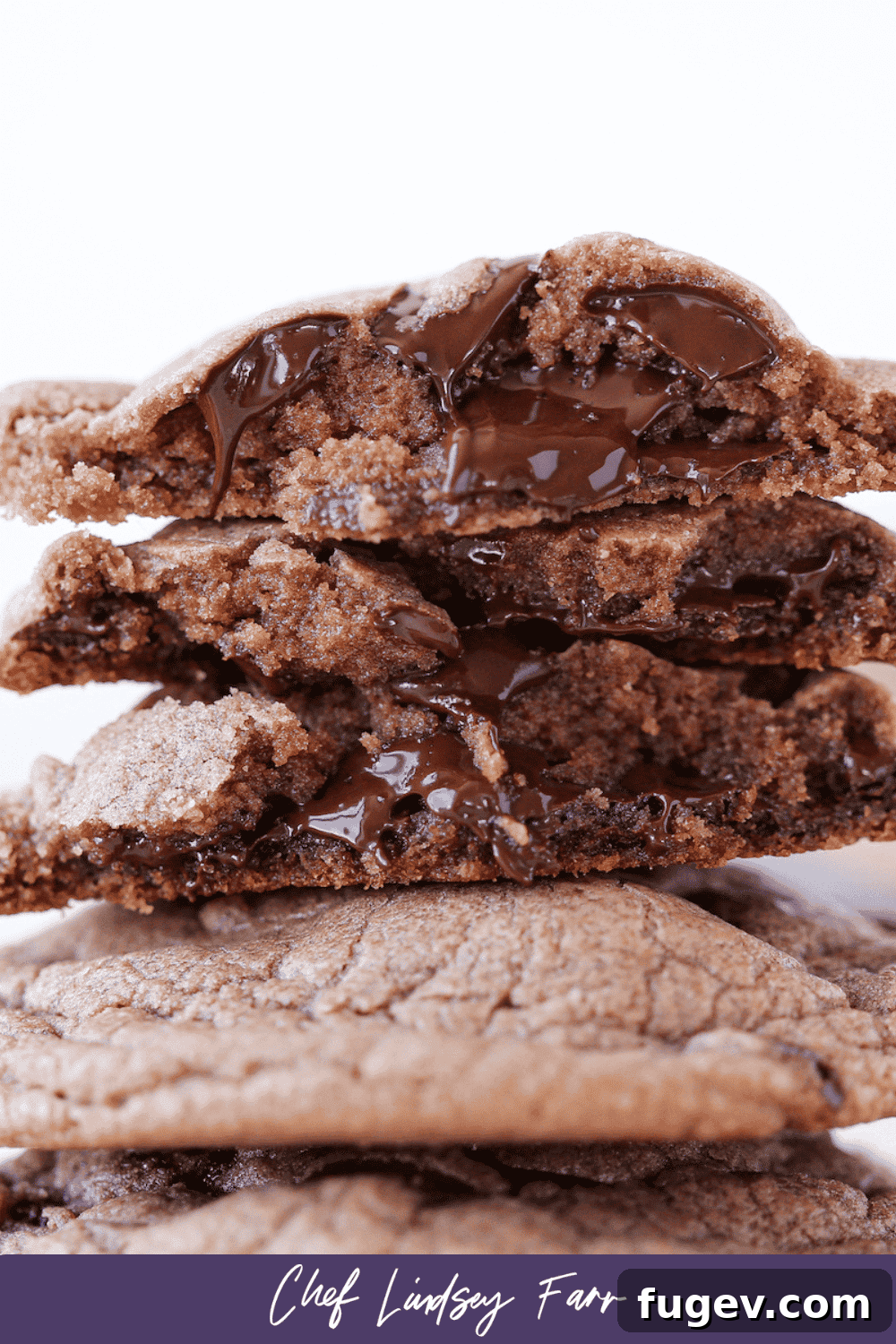 Gooey Nutella Cookies 8 Stacked Nutella cookies showcasing their gooey chocolate centers and soft texture.