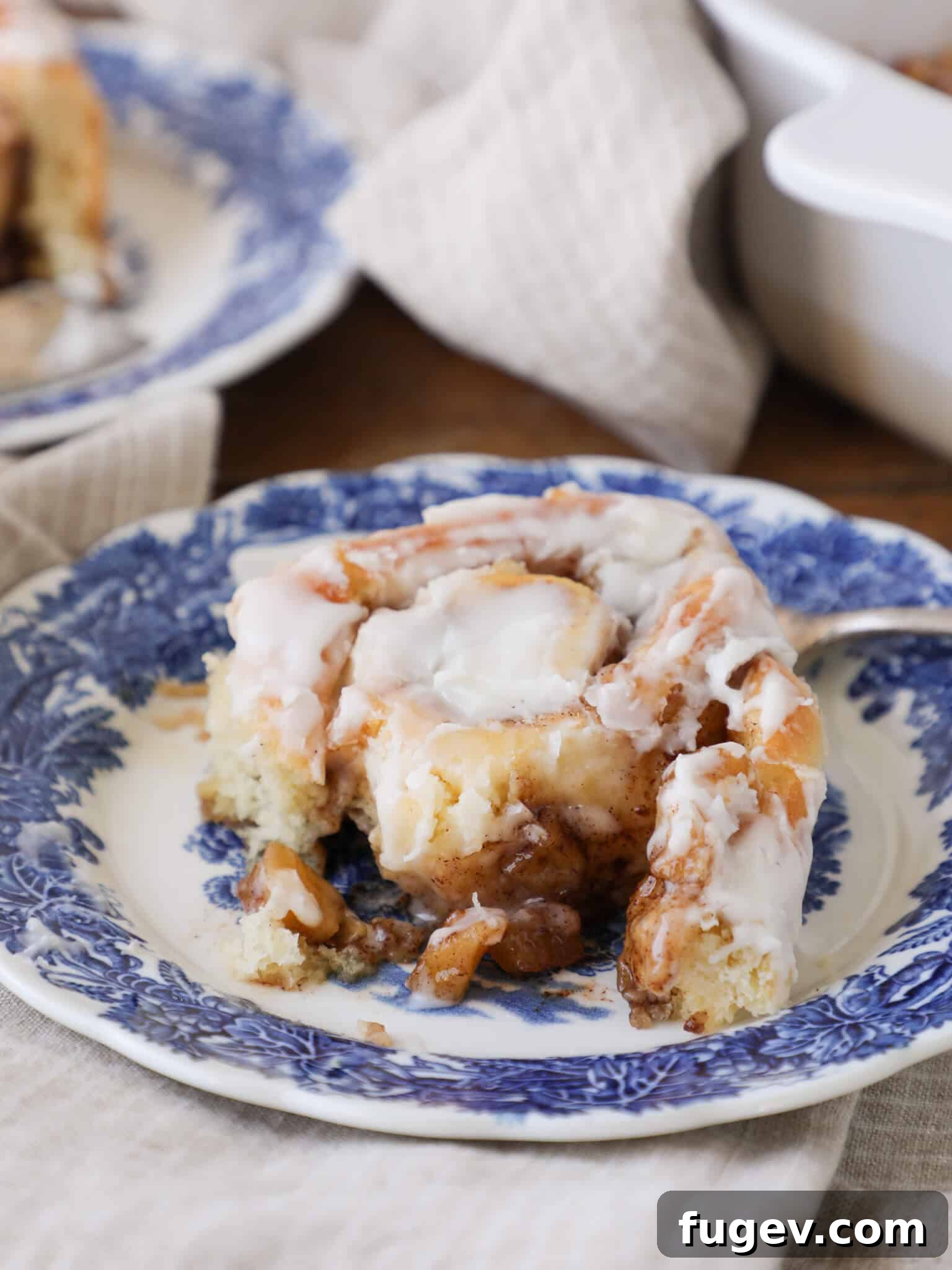 Warm Apple Cinnamon Rolls 2 Bitten Apple Cinnamon Roll with Cream Cheese Frosting