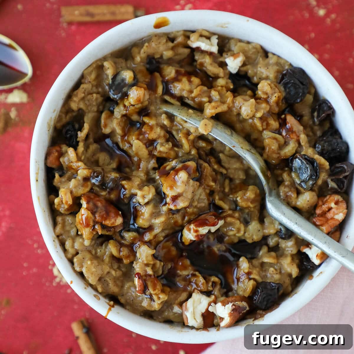 Gingerbread Spiced Oatmeal 4 A spoonful of gingerbread oatmeal, showing its creamy texture and spice specks.