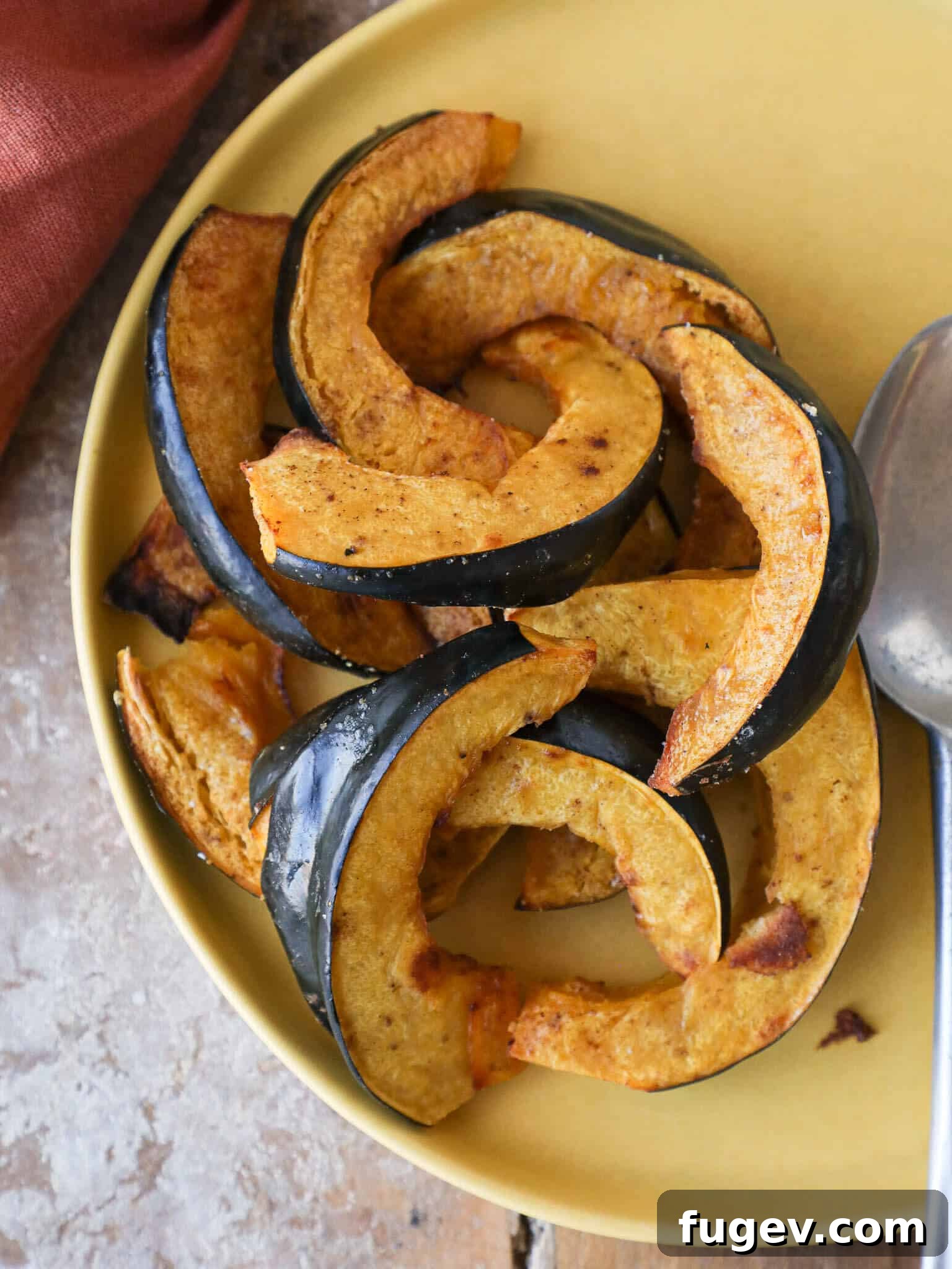 Caramelized Acorn Squash Slices 2 Healthy Roasted Acorn Squash on a Yellow Plate - A perfect side dish for any occasion.