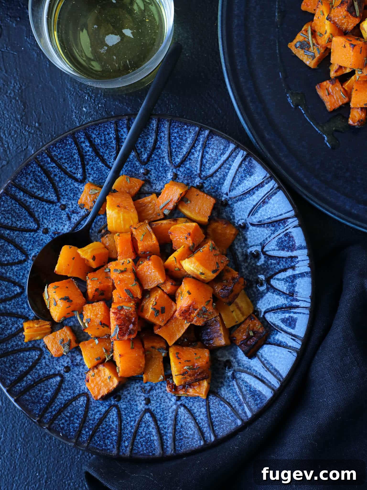 Harvest Spice Roasted Butternut Squash 2 Seasoned Baked Gourd Plated - Perfectly roasted spiced butternut squash cubes on a plate