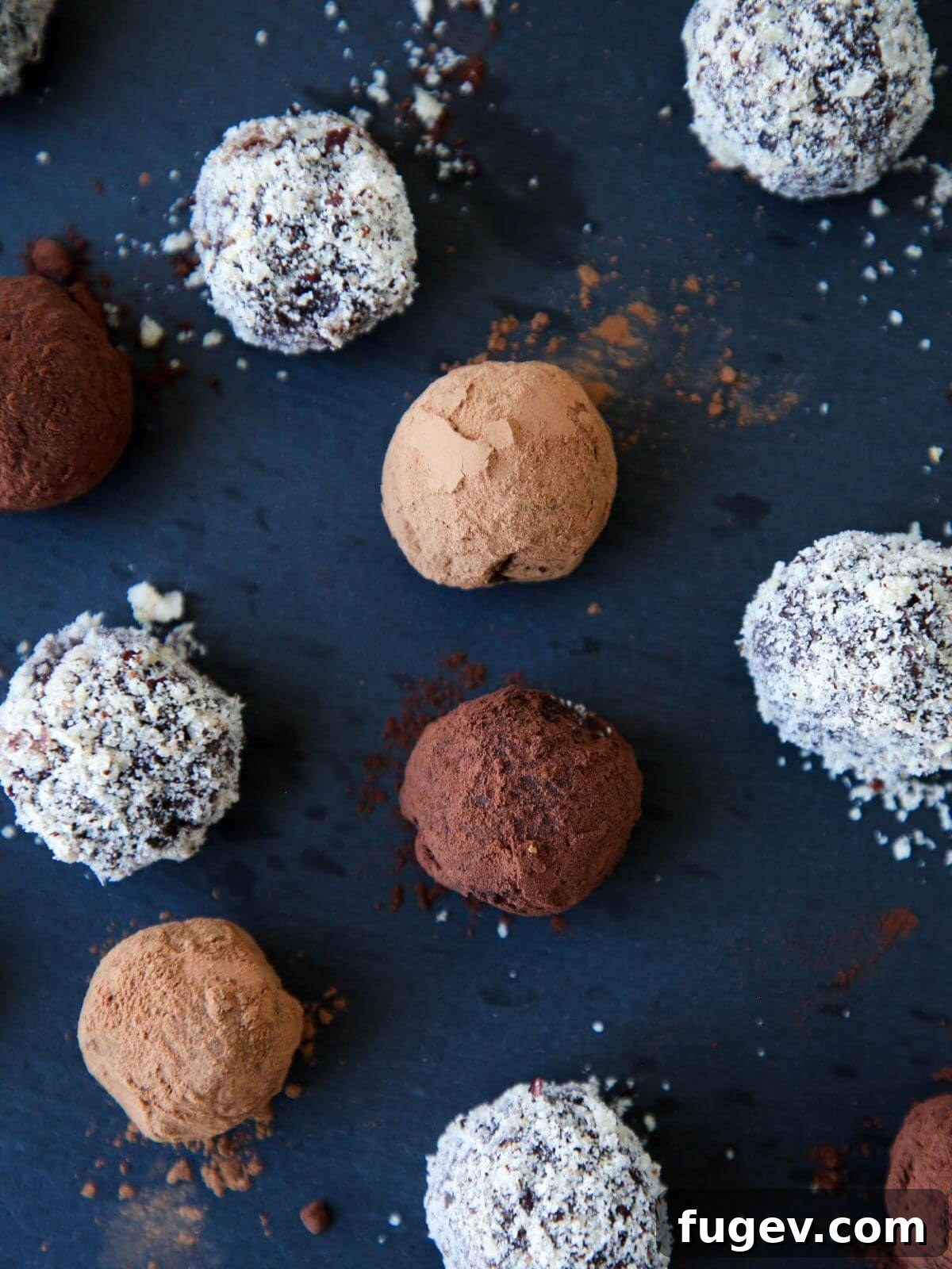 Nutella Bliss Bites 4 Nutella truffles covered with various coatings like powdered sugar, cocoa powder, and chopped nuts.