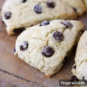 Chocolate chip breakfast pastry on a wood board, an inviting morning treat.