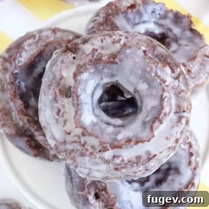 Chocolate Cake Donut overhead view, showcasing its delicious glaze.