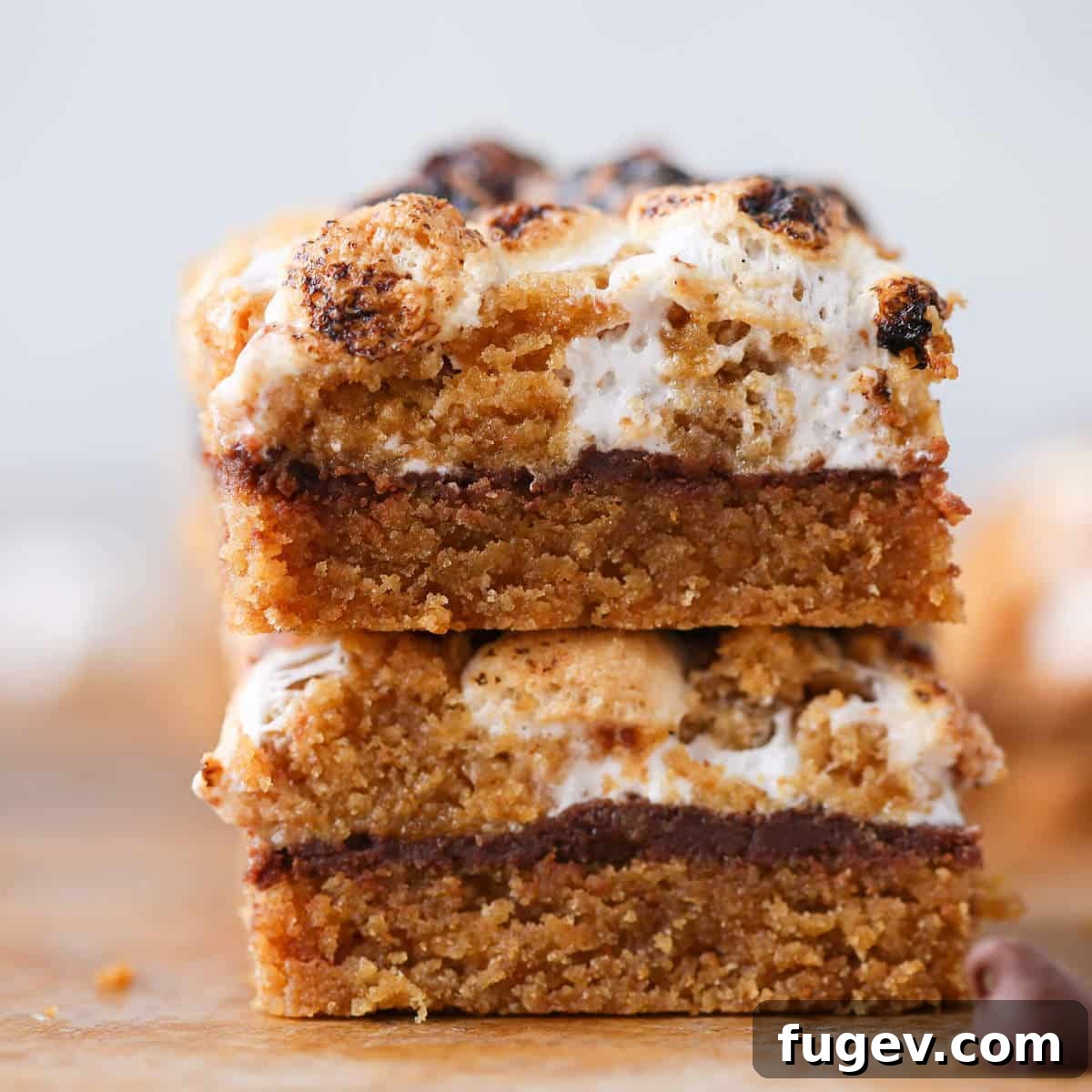 Ooey Gooey S'mores Crumble Bars 7 Soft Chewy S'mores Crumble Bars beautifully sliced and stacked, ready to serve