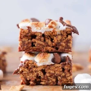 No Bake Golden Graham Smores Bars sliced stacked