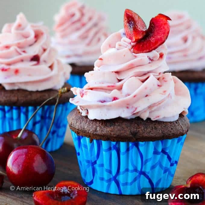 Velvet Double Chocolate Cherry Mascarpone Cupcakes 5 A row of expertly frosted Double Chocolate Cupcakes