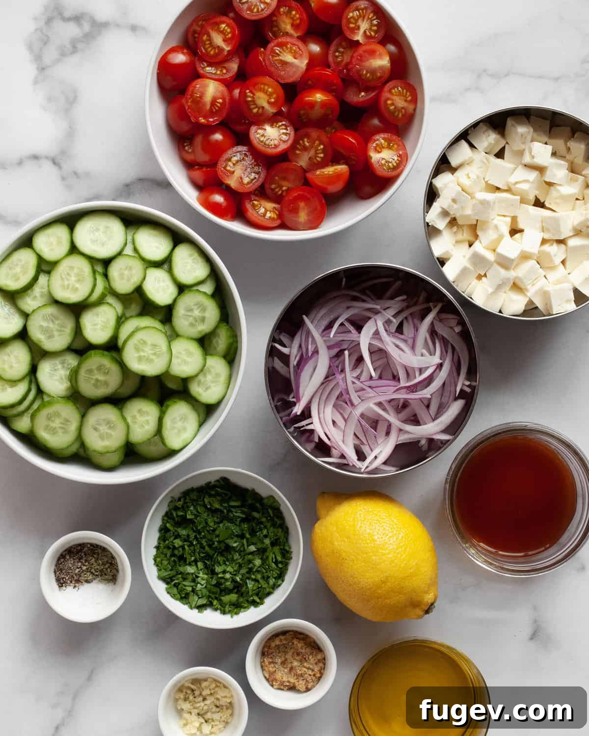 Mediterranean Feta Salad 3 Ingredients including cucumbers, tomatoes, red onions. feta, parsley, lemon, olive oil, spices and garlic.