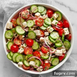 Cucumber tomato feta salad in a bowl.