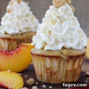 Summer Peach Crisp Cupcakes with Whipped Vanilla Swiss Meringue 7 Peach Crisp Cupcakes filled with peach compote and topped with Swiss meringue buttercream