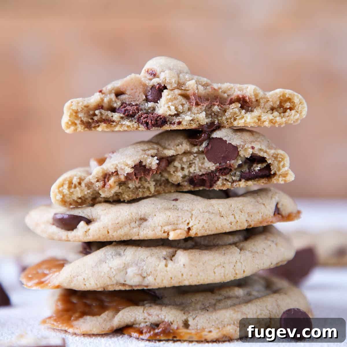 Molten Caramel Snickers Brown Butter Chocolate Chip Cookies 3 Caramel Stuffed Brown Butter Snickers Chocolate Chip Cookies stacked interior detail