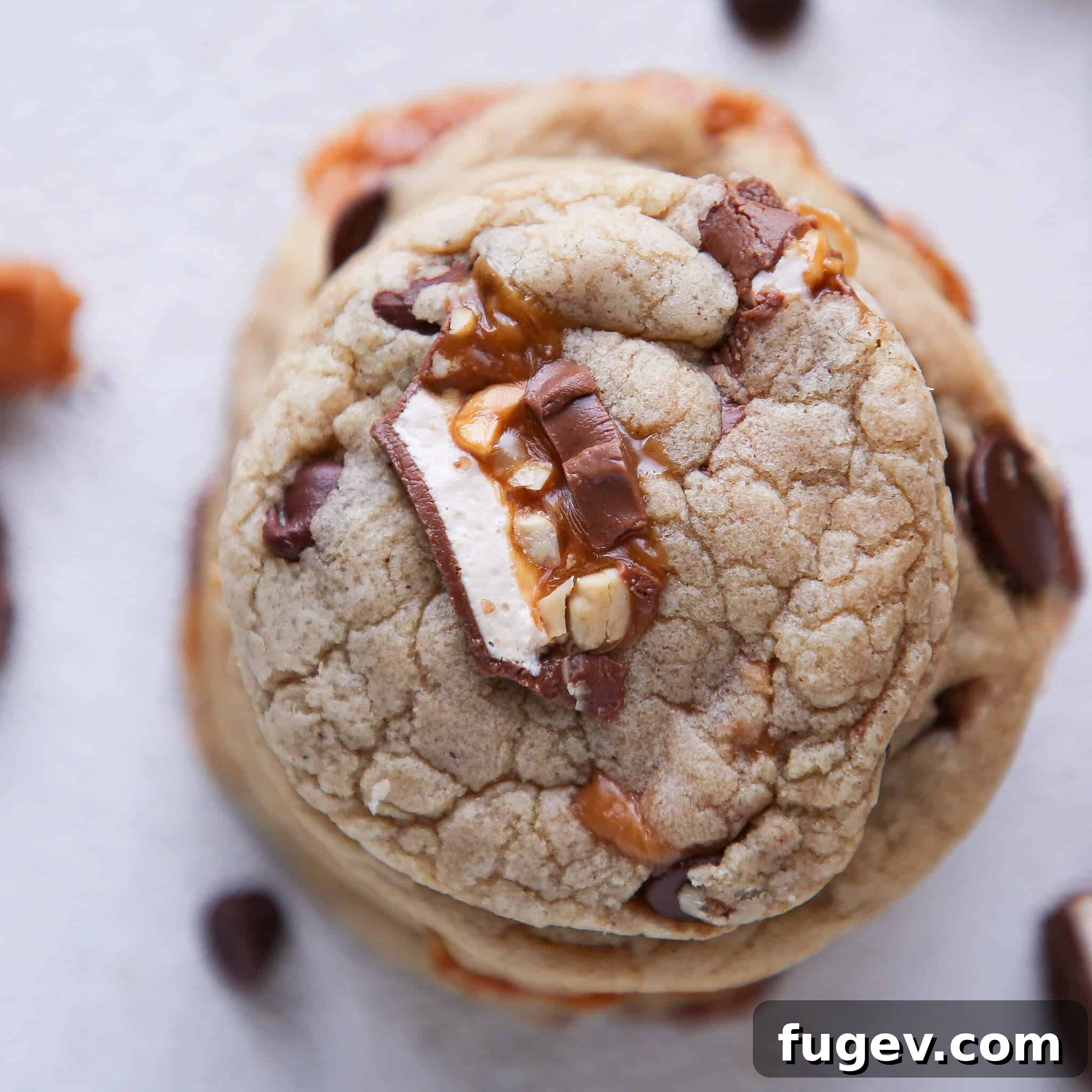 Molten Caramel Snickers Brown Butter Chocolate Chip Cookies 4 Caramel Stuffed Brown Butter Snickers Chocolate Chip Cookies stacked