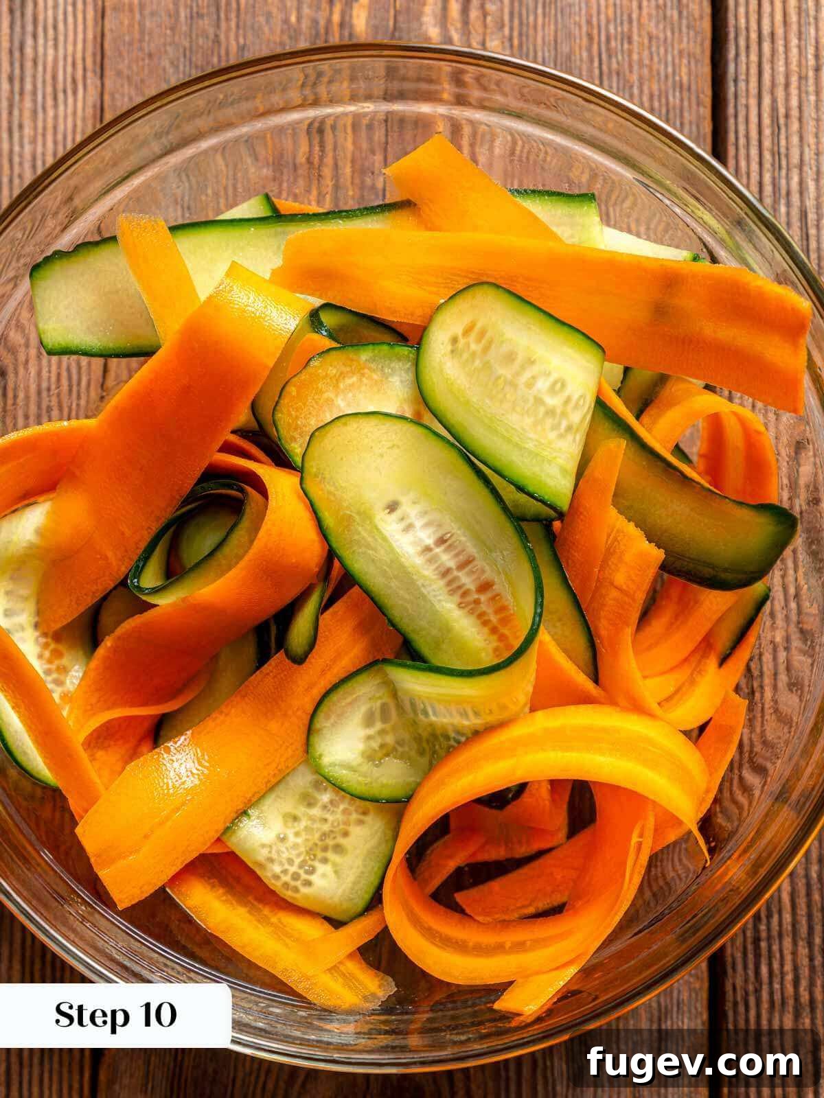 Succulent Chicken Burgers 8 Thinly shaved pickled carrots and cucumbers in a bowl, ready to be served.