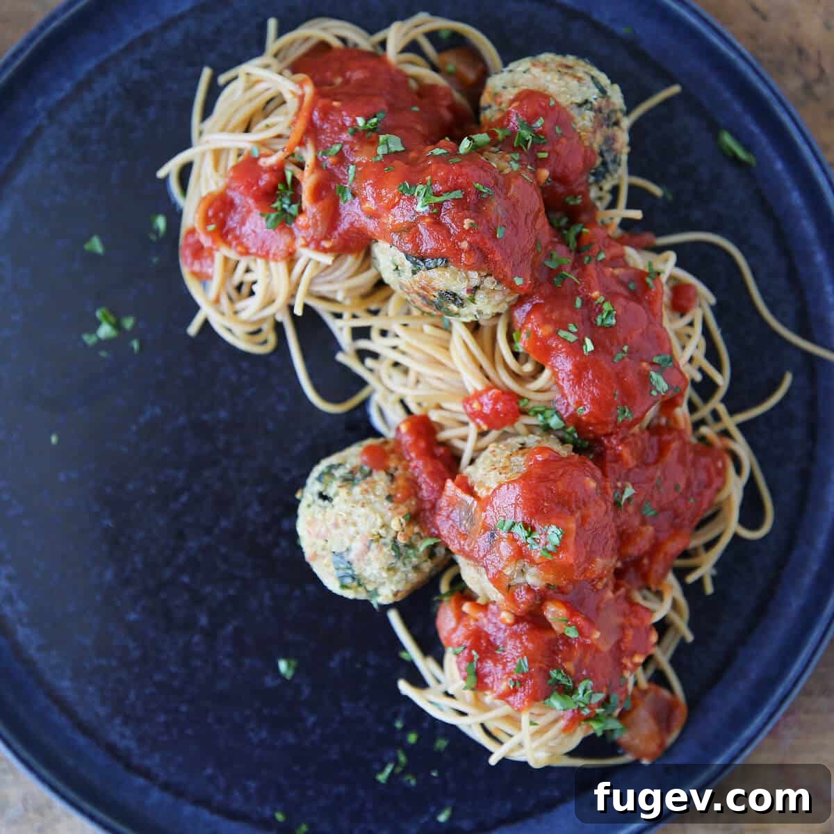 Wholesome Quinoa Veggie Meatballs 5 Herbivorous Italian dish in sauce on pasta