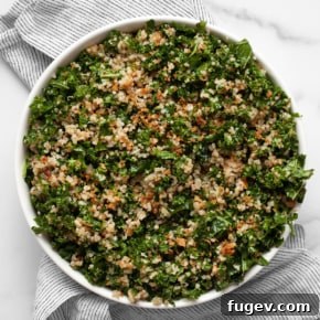 20 Fresh & Festive Thanksgiving Salad Recipes 11 Kale quinoa salad in a bowl.