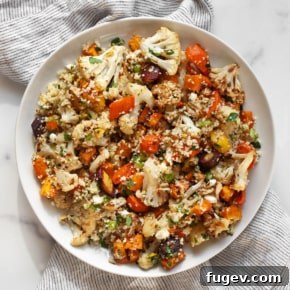20 Fresh & Festive Thanksgiving Salad Recipes 15 Roasted vegetable salad with sweet potatoes, cauliflower and sweet potatoes on a plate.