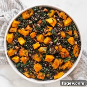 20 Fresh & Festive Thanksgiving Salad Recipes 16 Roasted pumpkin wild rice salad in a bowl.