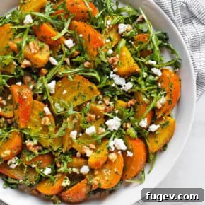 20 Fresh & Festive Thanksgiving Salad Recipes 7 Roasted golden beet salad on a plate.