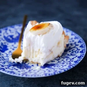 Banana Cream Pie slice showing layers of pastry cream and bananas