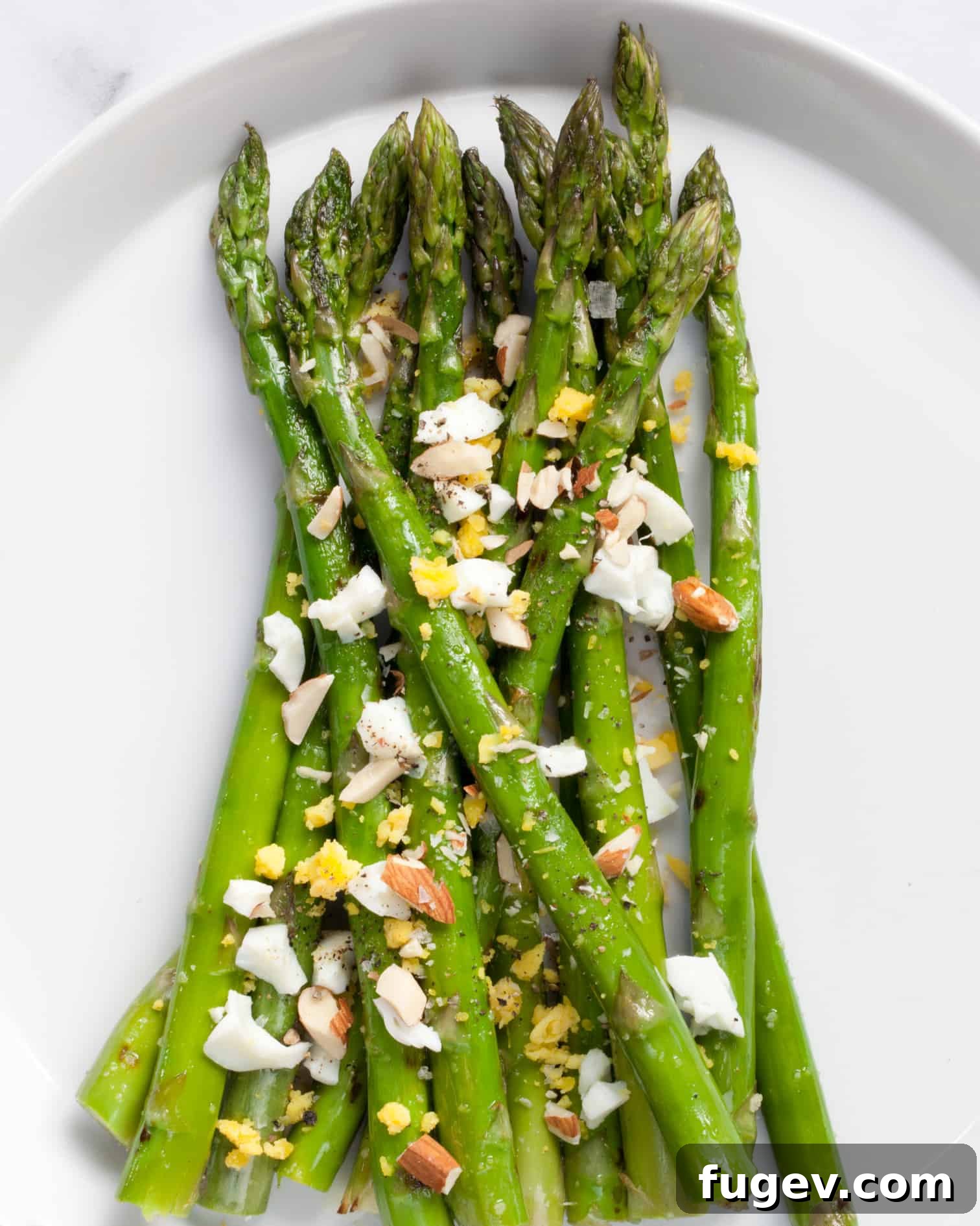 Seared Asparagus Medley 4 Hands preparing fresh grilled asparagus for a salad