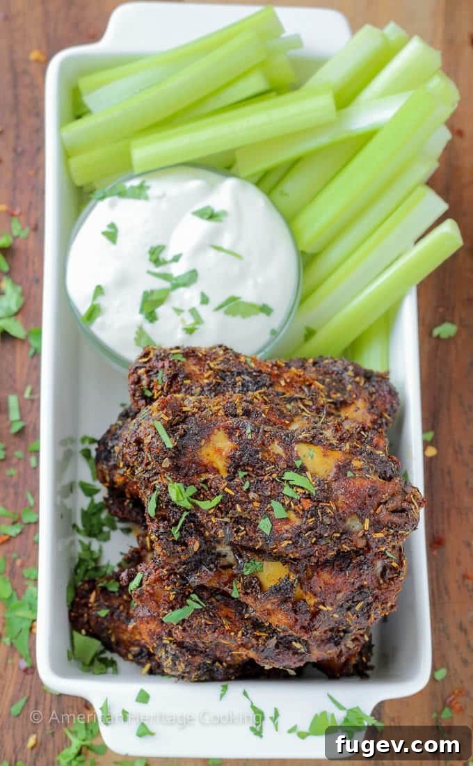 Crispy Baked Spice Medley Wings 5 A vibrant platter of dry rubbed baked chicken wings with fresh cilantro garnish