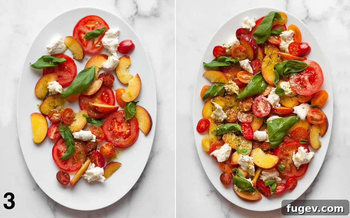 Summer Peach Caprese Salad 5 Assembling caprese salad on a large oval plate. Shows the layering process of peaches, tomatoes, mozzarella, and basil with a drizzle of pesto vinaigrette.