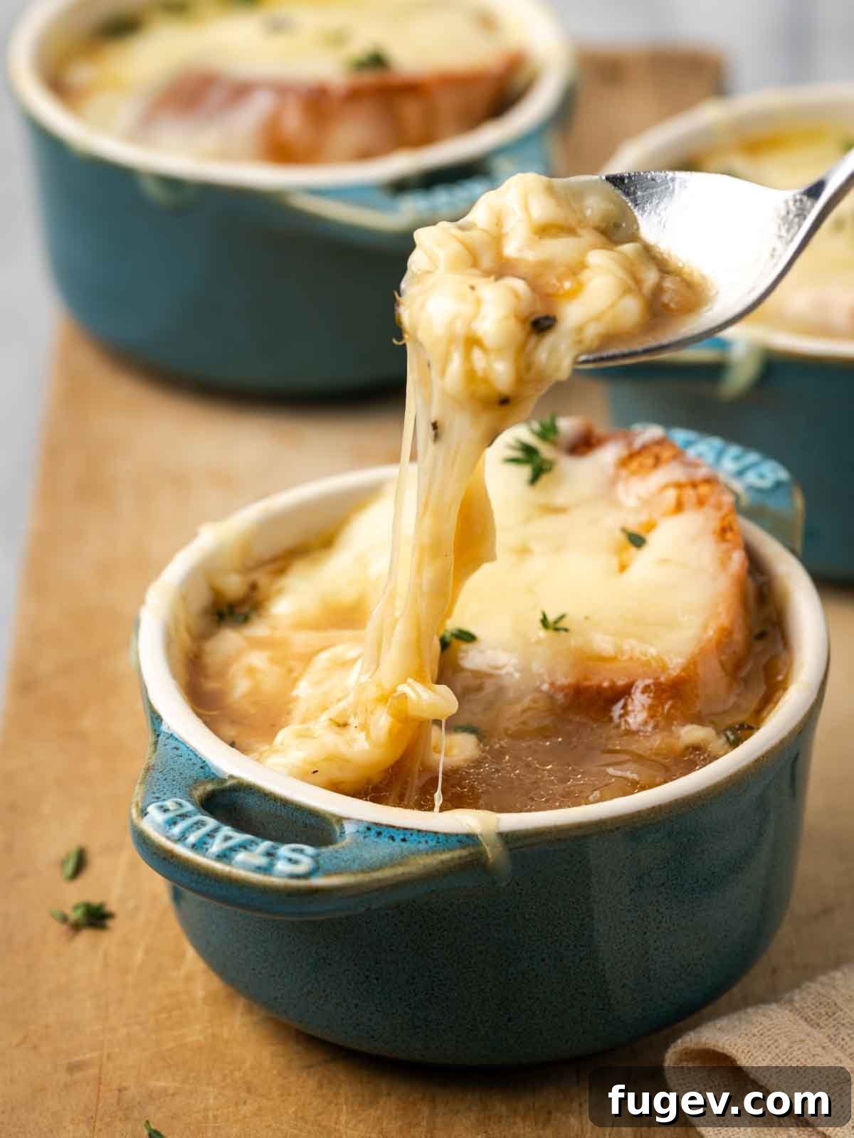The Quintessential French Onion 2 cheese pull from hot french onion soup.
