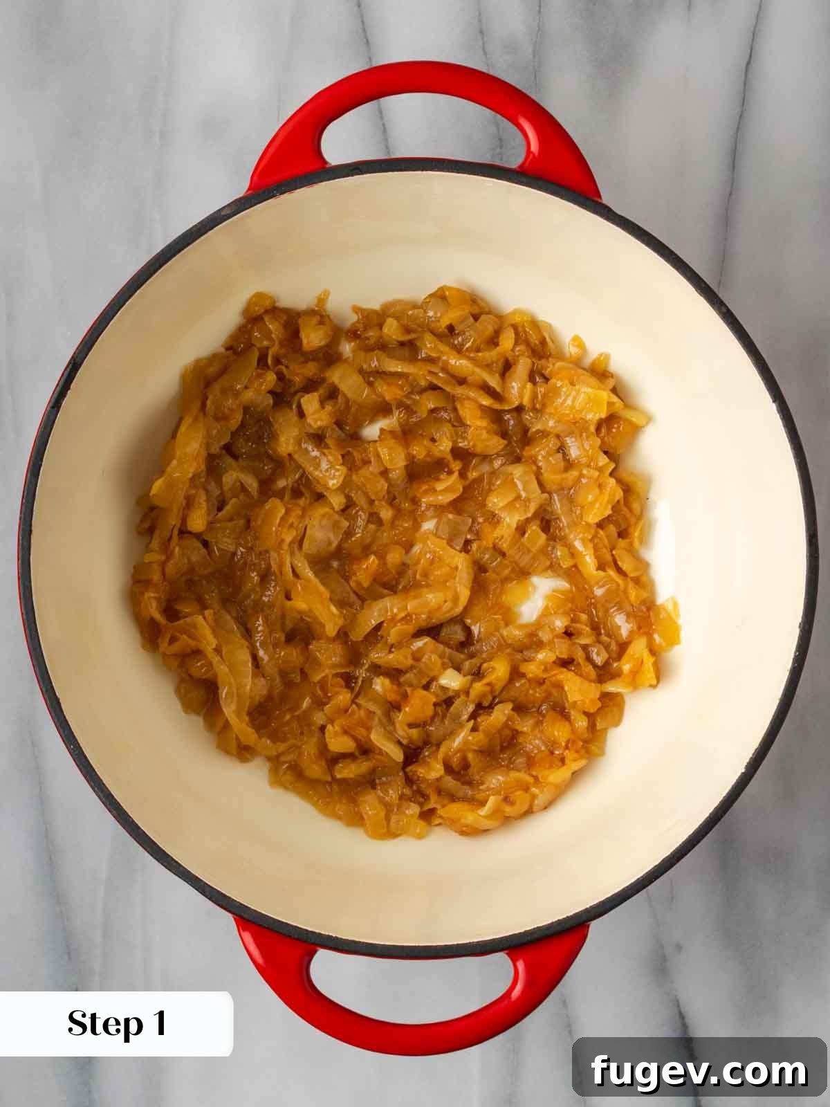 The Quintessential French Onion 5 caramelized onions in red pot.