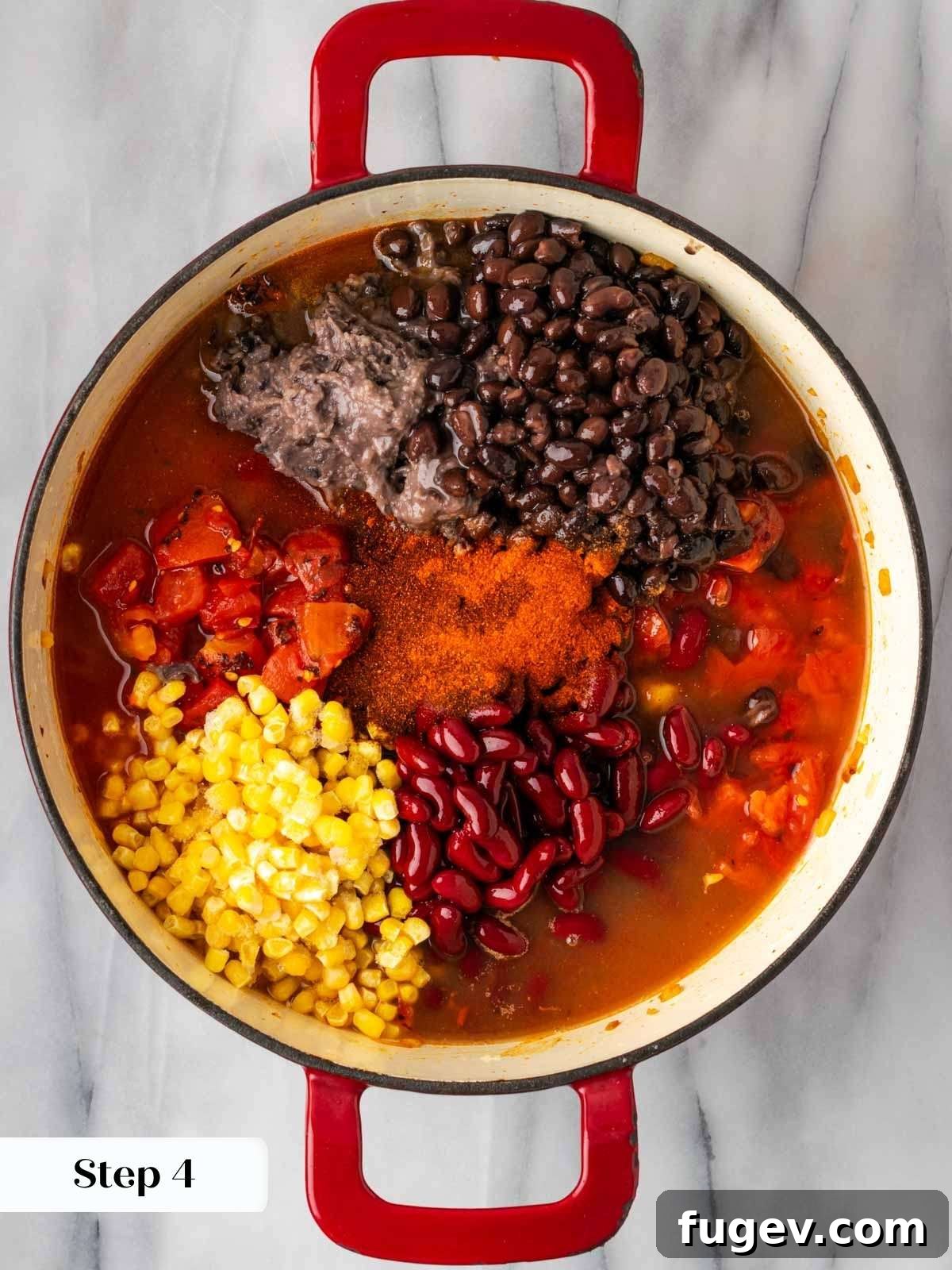 Smoldering Chipotle Chili 8 Various beans and corn being added to the simmering chili in a large pot, showing the process of combining all ingredients for a hearty meal.