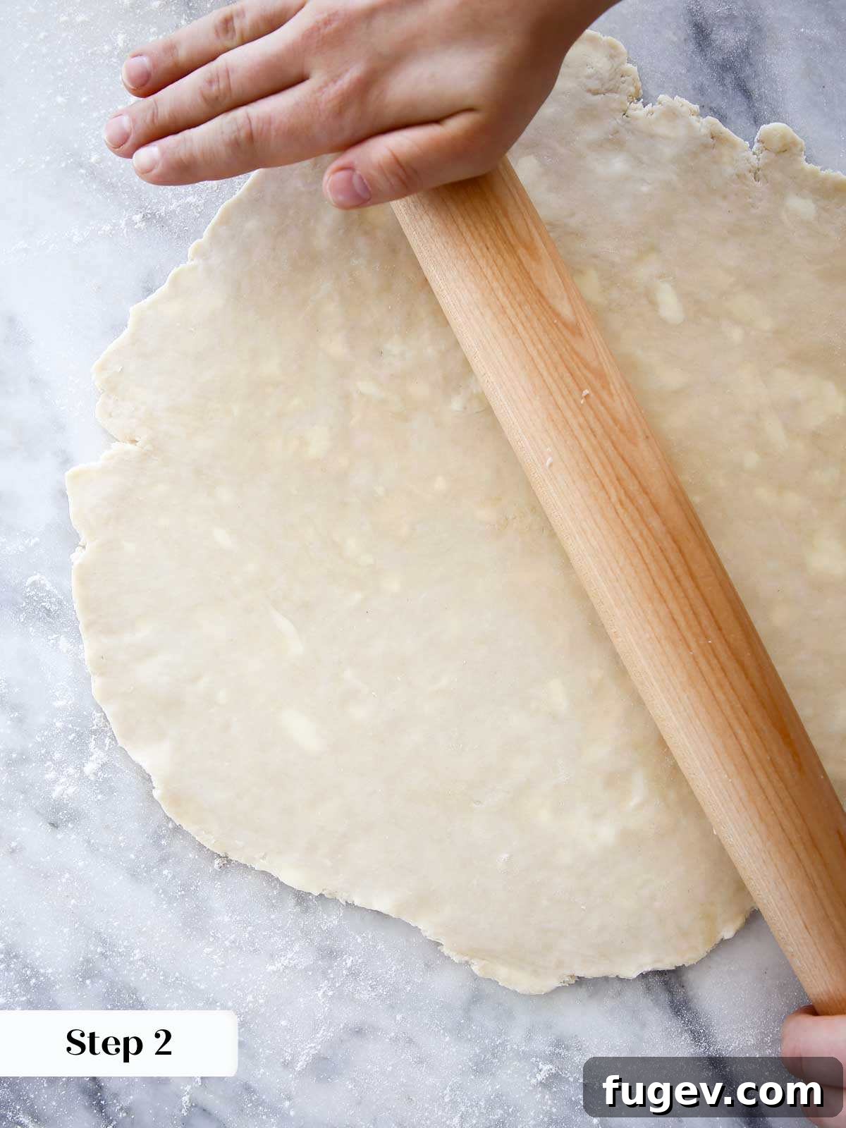 The Art of the Perfect Pie Lattice 4 A pastry chef rolling out pie dough thin on a marble surface, preparing it for intricate latticing.