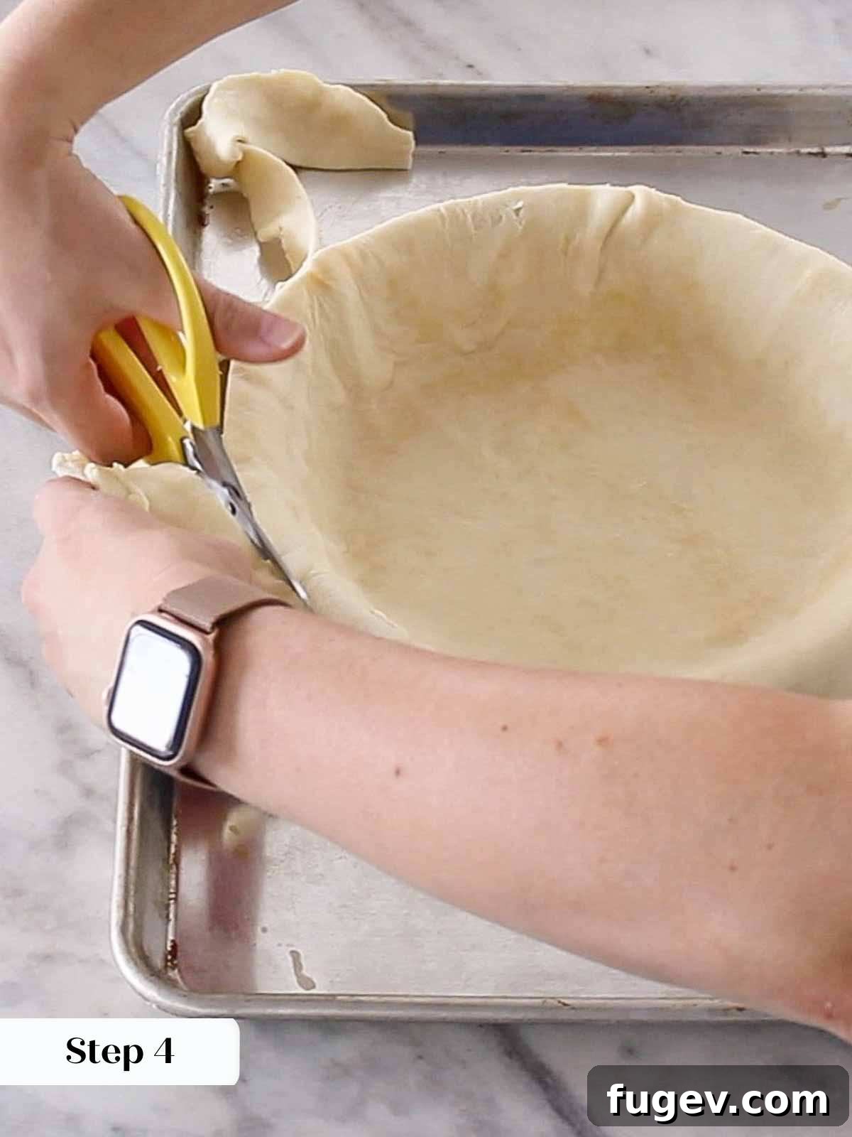 Pre-Bake Perfection: A Guide to Crisp Pie Crusts 6 A person precisely trimming excess pie dough from around the edge of a pie dish with sharp scissors.