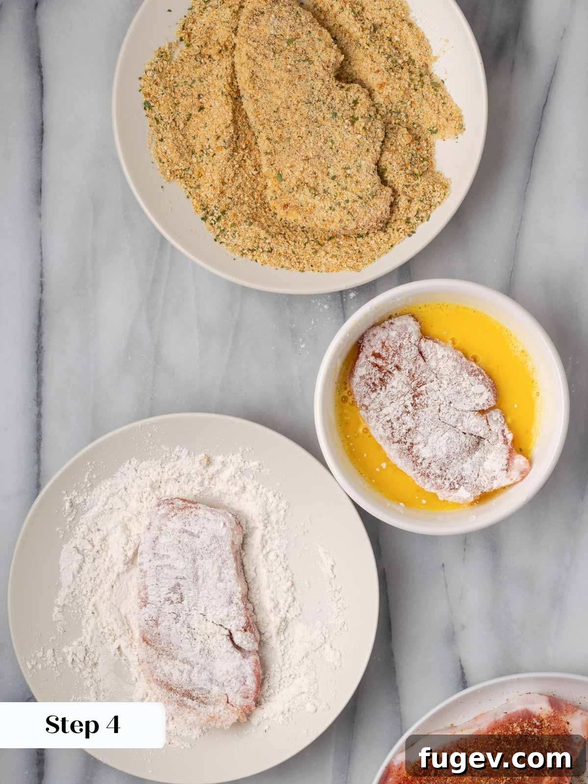 Creamy Mushroom Pork Chops 8 Process of dredging a pork chop in flour, then egg, and finally breadcrumbs for a crispy coating.