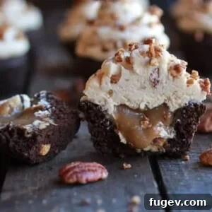 Chocolate Bourbon Pecan Pie Cupcakes with Butter Pecan Frosting by Half Baked Harvest. Pecan pie, but in cupcake form and so good.