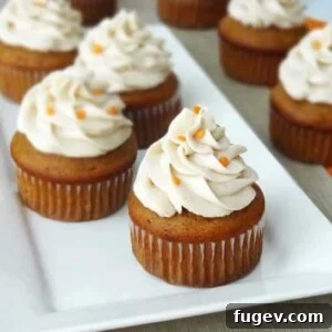 Pumpkin Cupcakes with Maple Cinnamon Cream Cheese Icing by Life, Love and Sugar. Fluffy, moist, and fall-spirited.