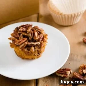 Pecan Pie Cupcakes by The Cupcake Project. Maple pecan cupcakes with butter pecan buttercream frosting.