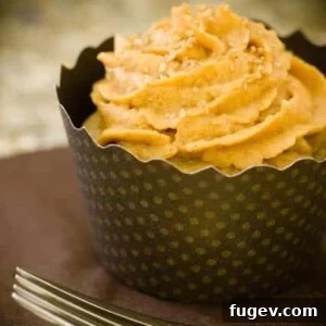 Apple Cobbler Cupcake with Pumpkin Pie Frosting (I know, right?!) by The Cupcake Project. Like eating an apple cobbler in cupcake form!