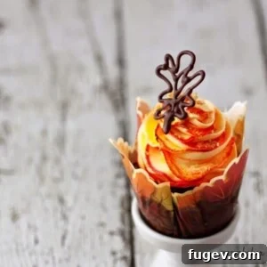 Chocolate Fall Leaves on Cupcakes by Pint Sized Baker. Yellow and Orange frosting with chocolate leaves are stunning for your Autumn Party.