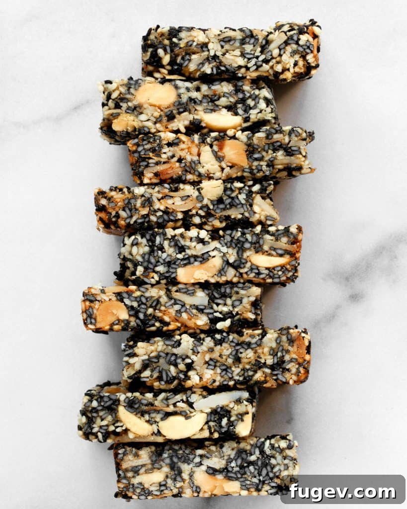 Golden Sesame Peanut Bars 3 Close-up of freshly baked and sliced Sesame Peanut Bars, showing their texture