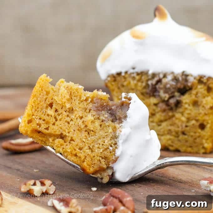 Mini Sweet Potato Casseroles 3 Close-up of a Sweet Potato Casserole Cupcake, showcasing the rich cake and pecan topping before frosting.