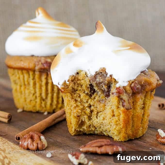 Mini Sweet Potato Casseroles 5 Sweet Potato Casserole Cupcakes with a swirl of marshmallow frosting, ready for torching.