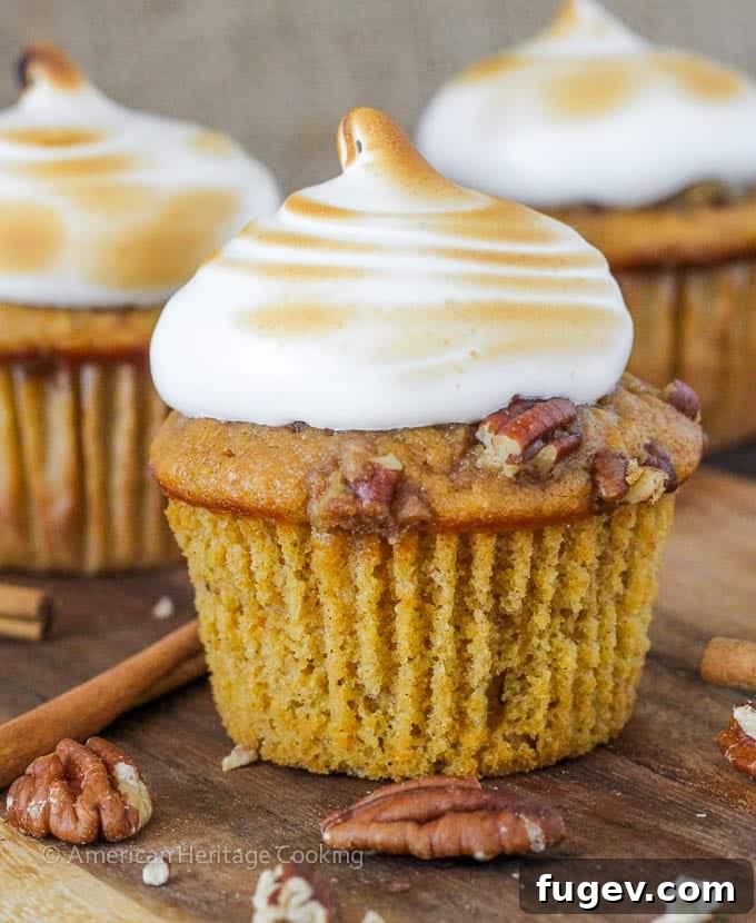 Mini Sweet Potato Casseroles 7 A close-up of a perfectly baked Sweet Potato Casserole Cupcake, showing the golden-brown toasted marshmallow.