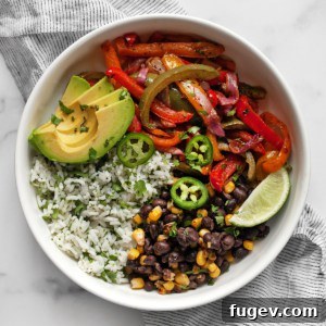One-Pan Vibrant Veggie Fajita Bowls 8 Veggie fajita bowl with roasted peppers and onions and cilantro lime rice.