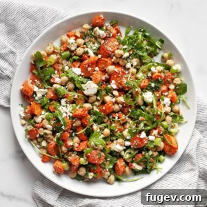 Roasted carrot chickpeas salad on a plate.