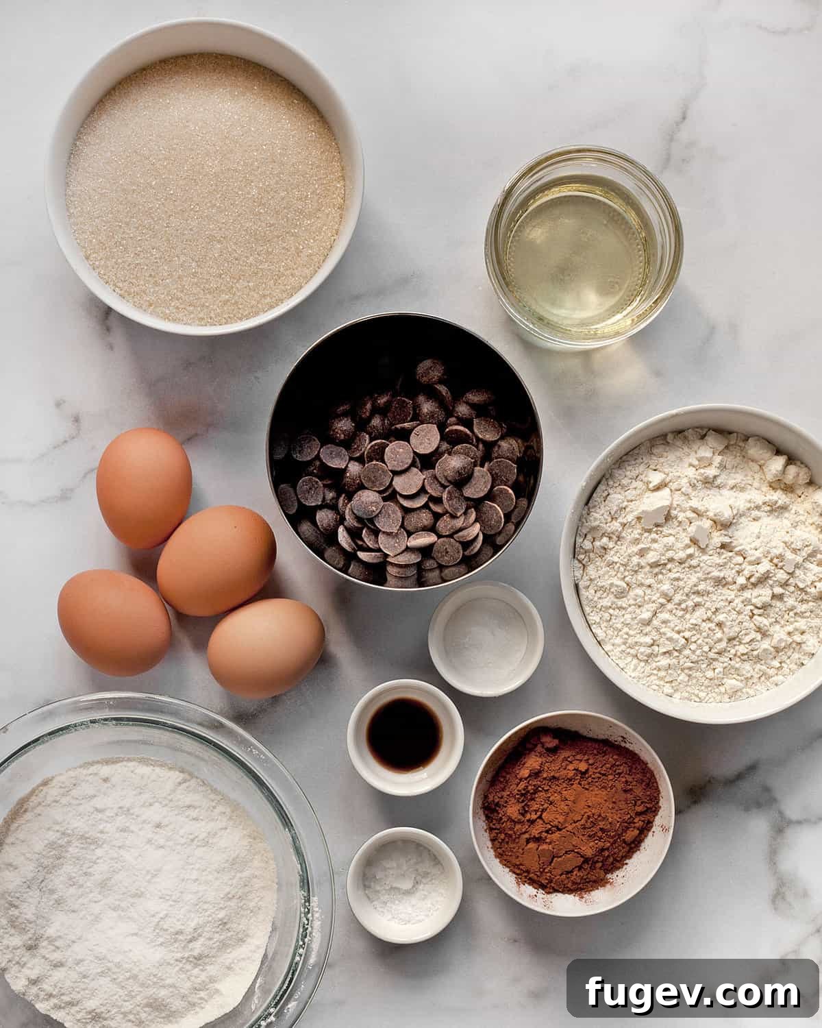 Fudgy Crinkle Delights 3 Ingredients including chocolate, cocoa powder, sugar, flour, eggs and salt.