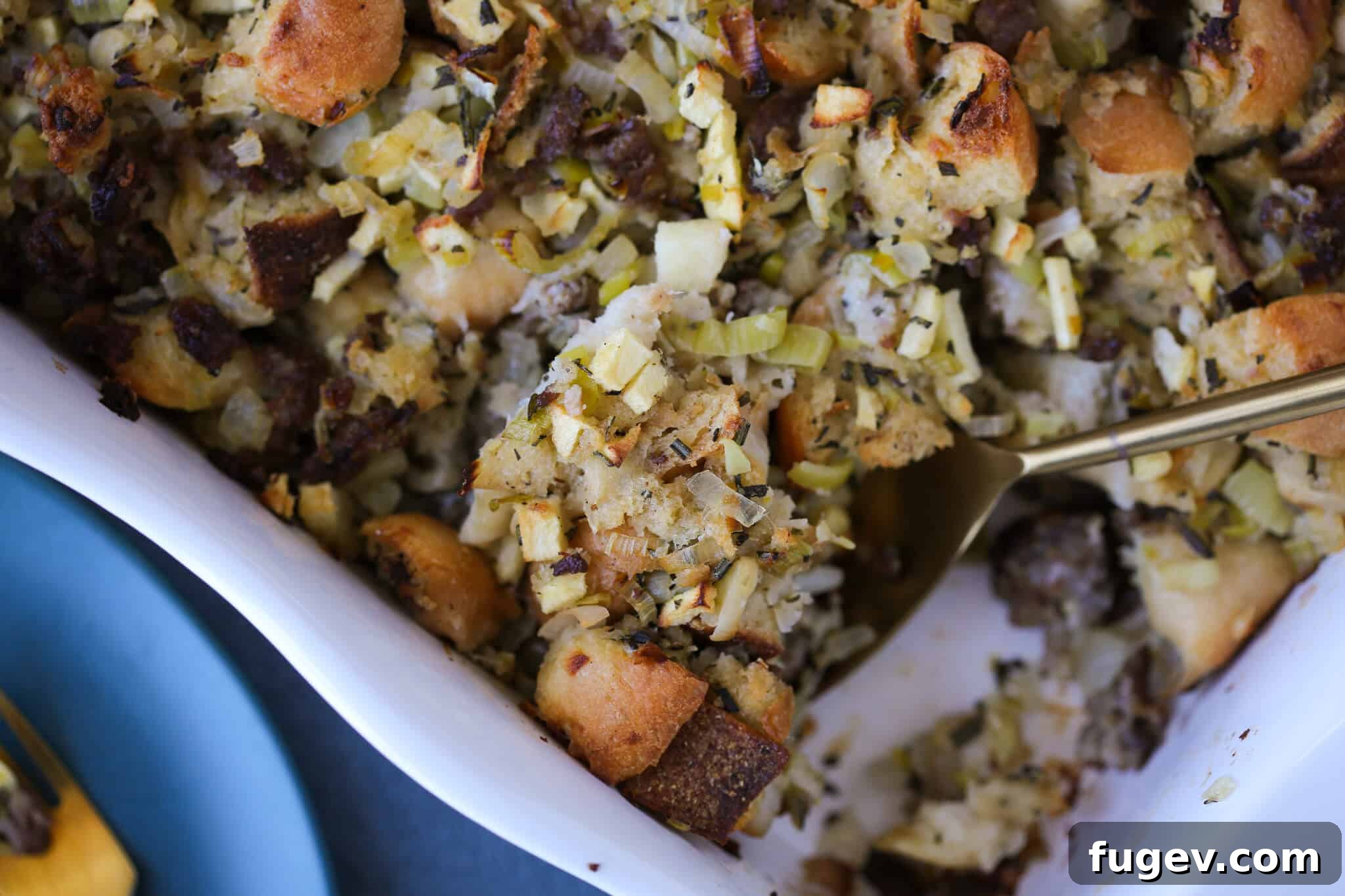 Golden Apple Sausage Stuffing 4 Apple Sage Sausage Stuffing with a beautiful, toasty crust of golden bread on top.