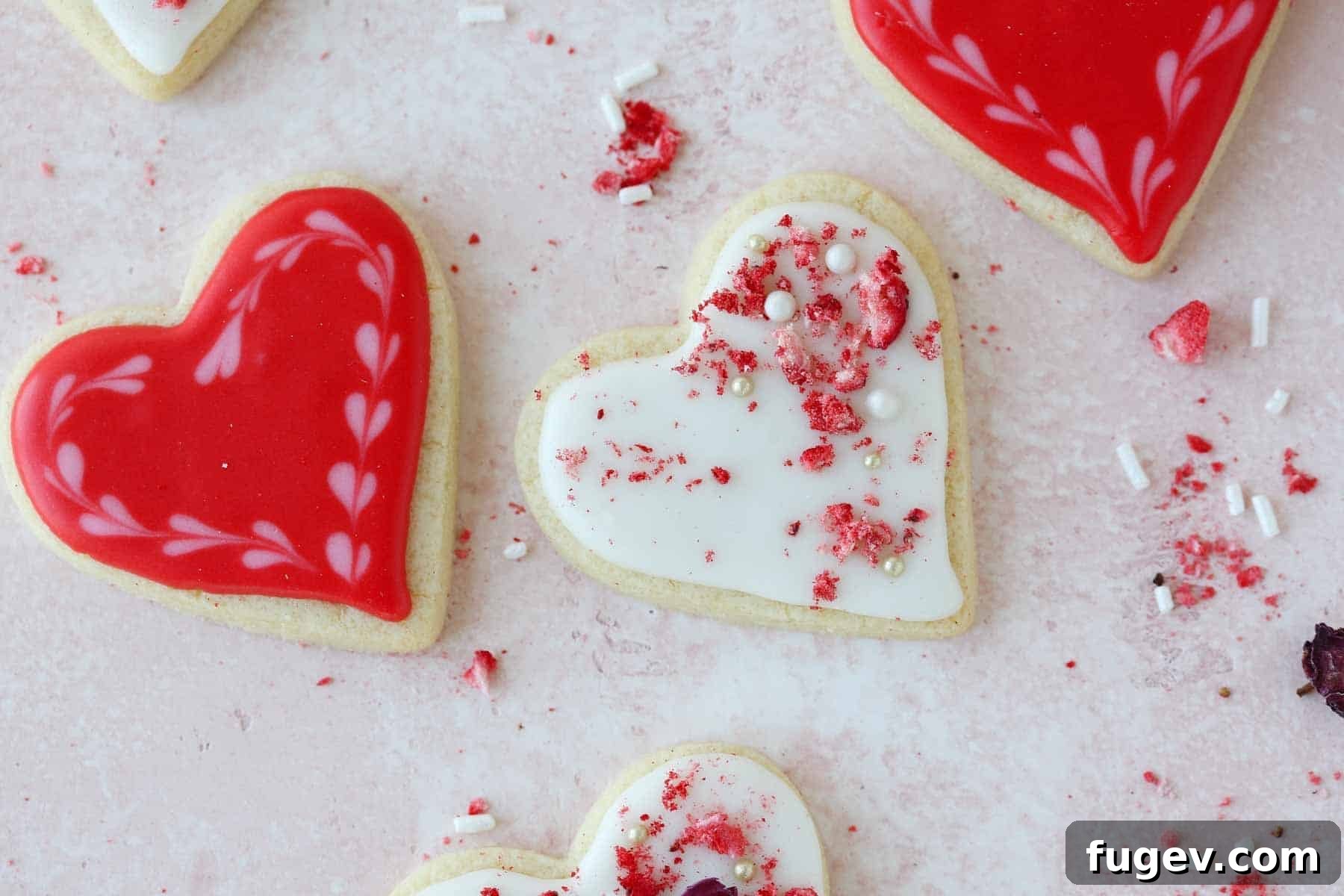 Cupid's Confections 20 A charming display of red and white decorated sugar cookies, perfect for Valentine's celebrations.