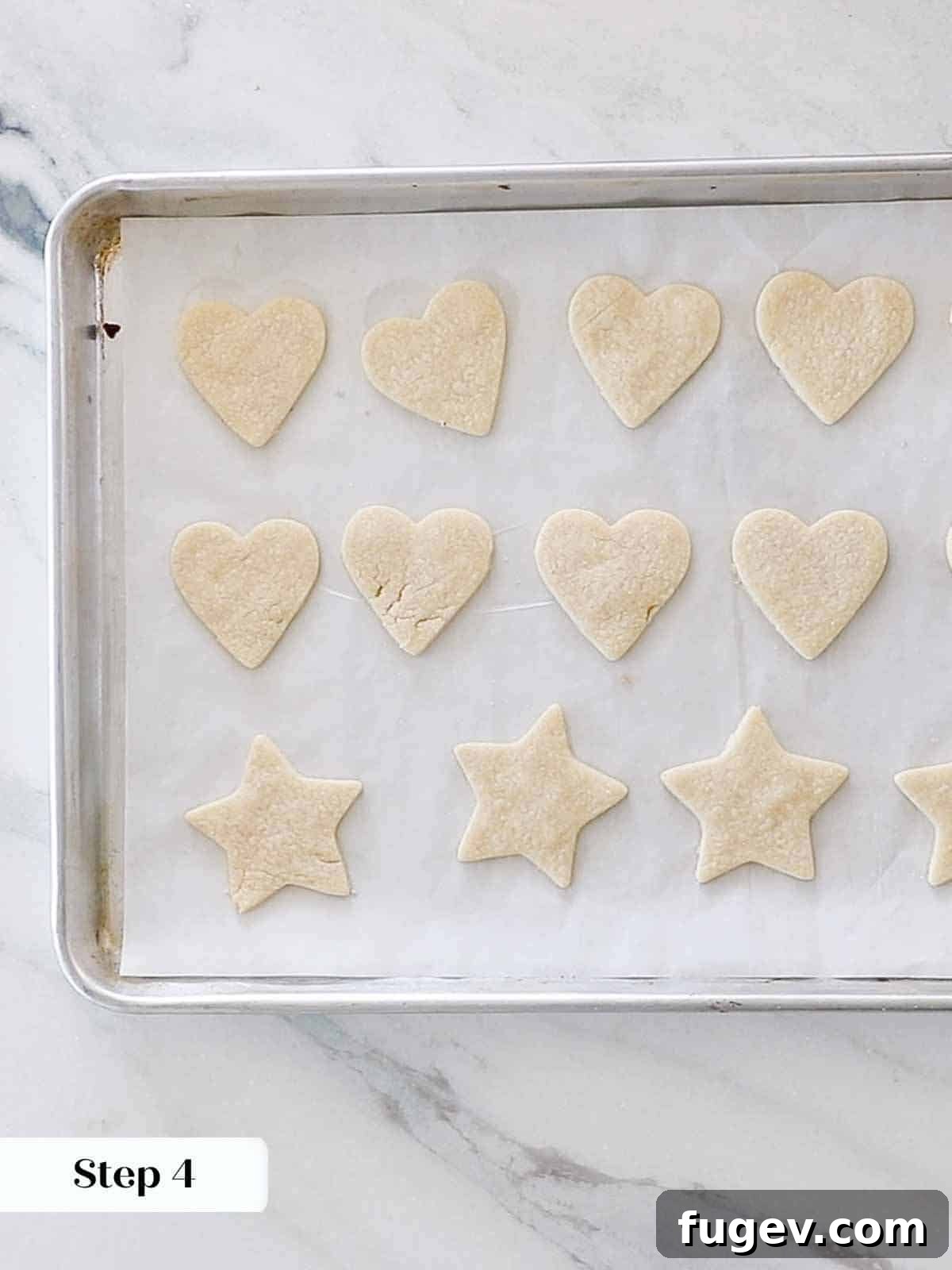 Cupid's Confections 10 Perfectly baked heart-shaped sugar cookies cooling on a baking sheet, ready for decoration.